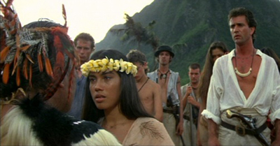 scene showing Fletcher's Tahitian wife 
 talking to her father about leaving Tahiti. Fletcher is standing there watching.