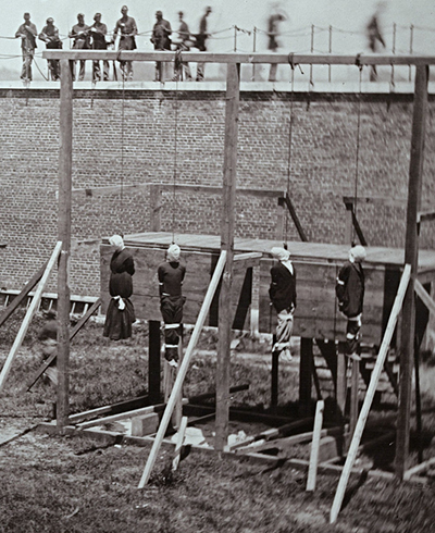 actual photo showing the 4 convicted conspirators hung.