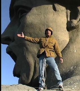 This is a photo of me standing by the head 
of the 'Motherland Calls' statue.